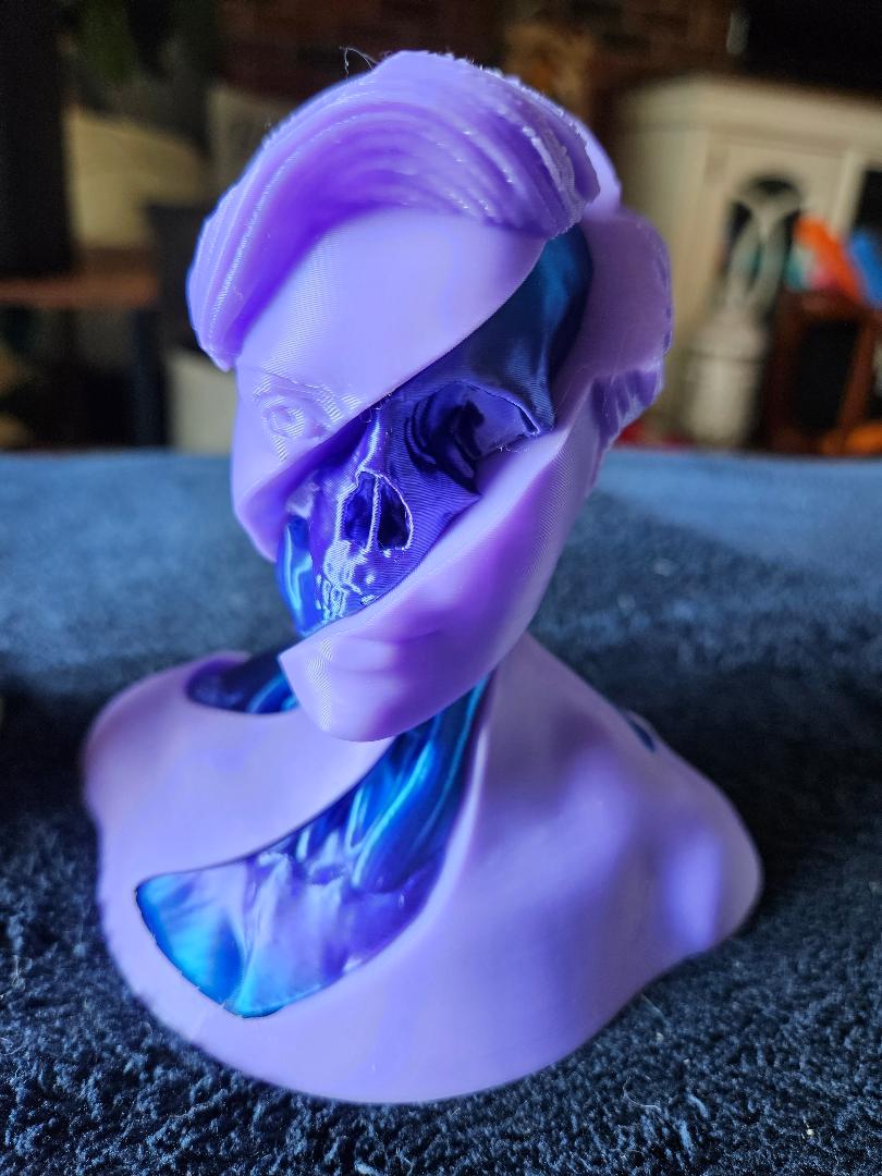 Fidget spinning skull head