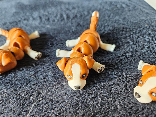 Articulating puppy keychain