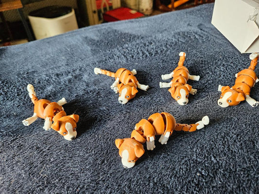 Articulating puppy keychain